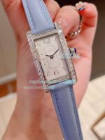 Replica Cartier Tank  Americaine Watch  Stainless Steel Case White Dial Blue Leather Strap 36mm